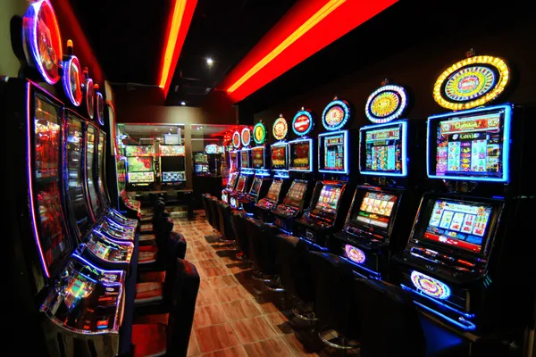 A confident dealer surrounded by casino chips inviting players to access their BB444 account, reflecting quick and easy login options.